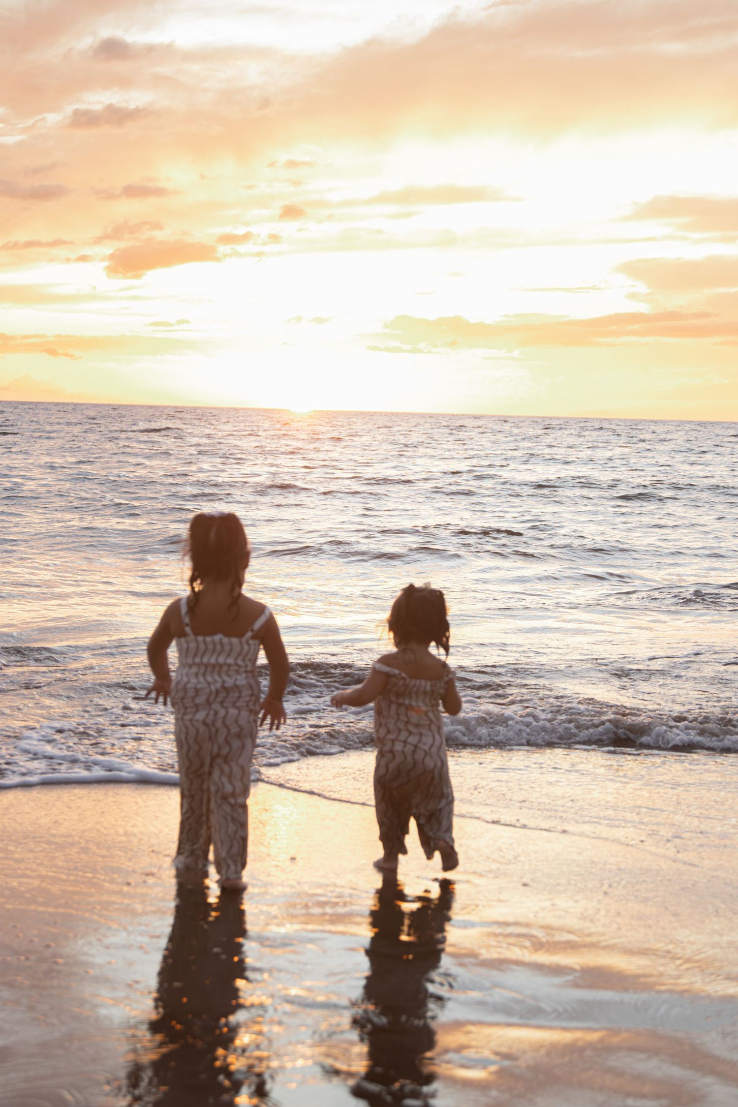 family photoshoot on a beach in maui