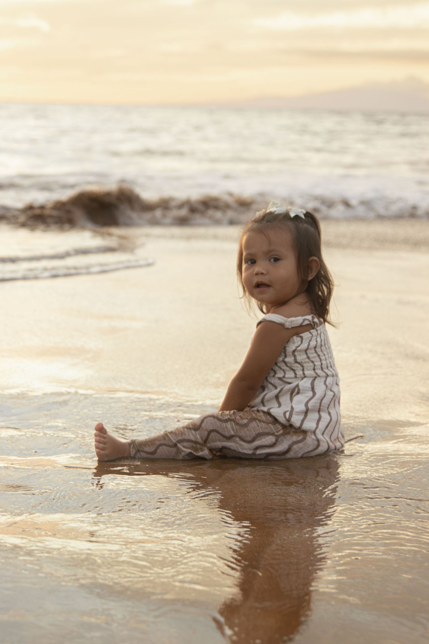 family photoshoot on a beach in maui
