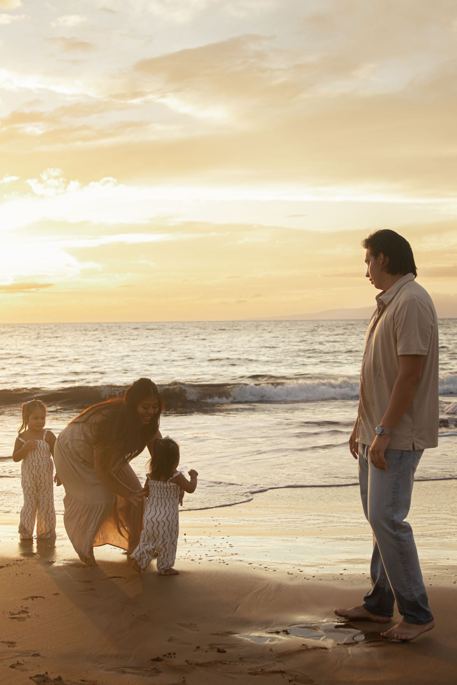 family photoshoot on a beach in maui