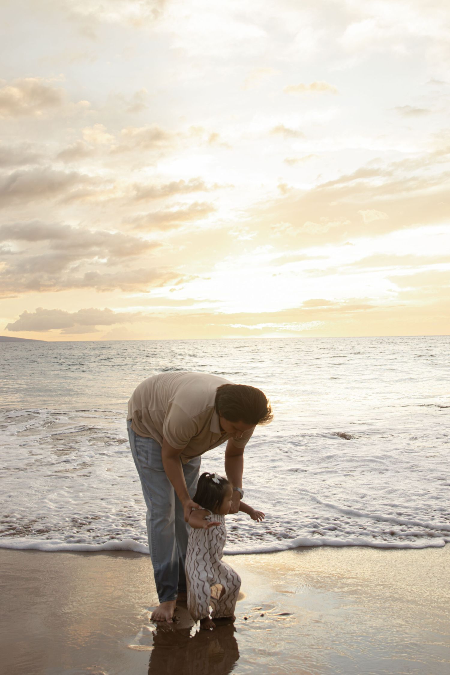 family photoshoot on a beach in maui