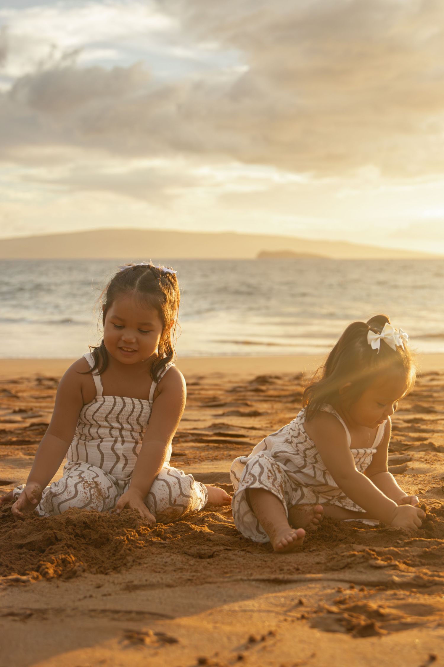 family photoshoot on a beach in maui
