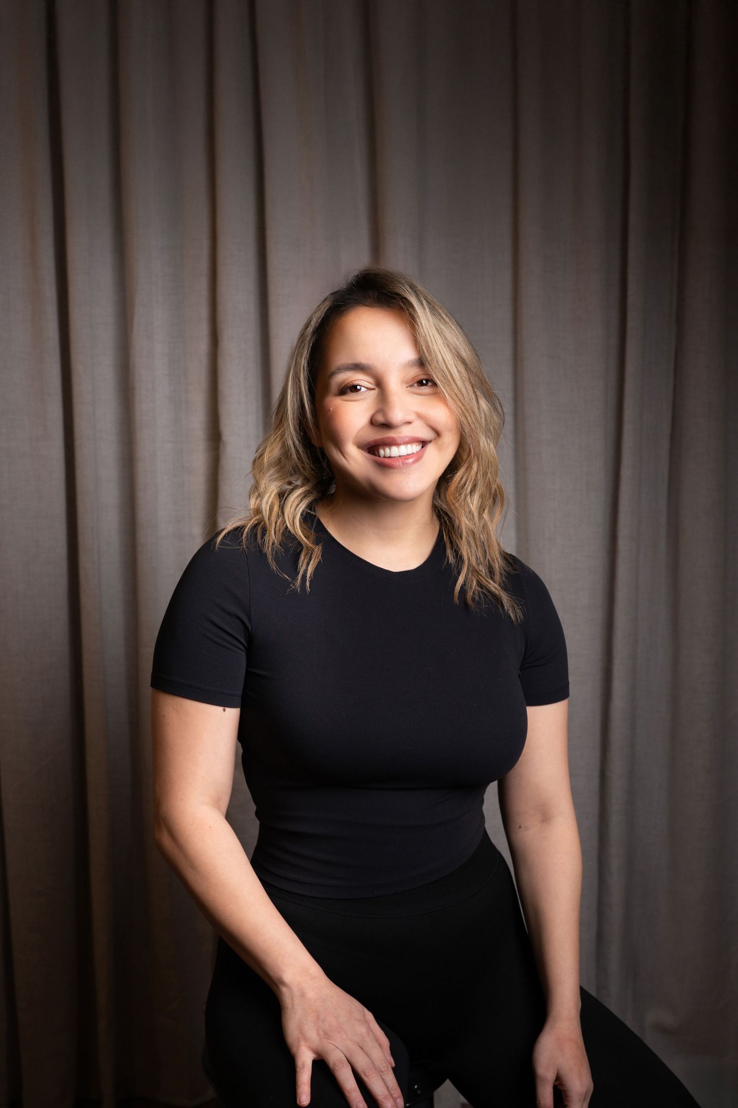 Headshot of Louise, Adelaide-based photographer specializing in portraits, headshots, events, and small business branding