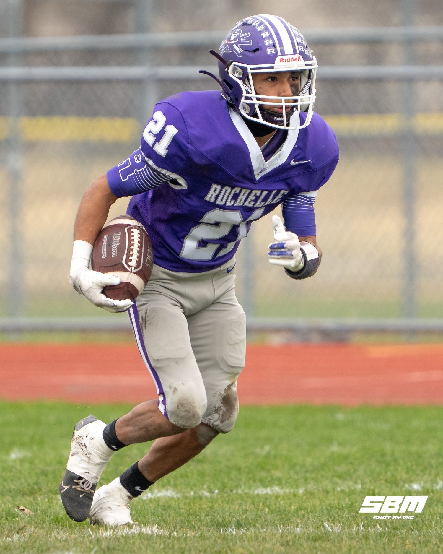 Rochelle's Xavier Villalobos gets the kickoff return during thier 42-8 loss against Nazareth Academy.