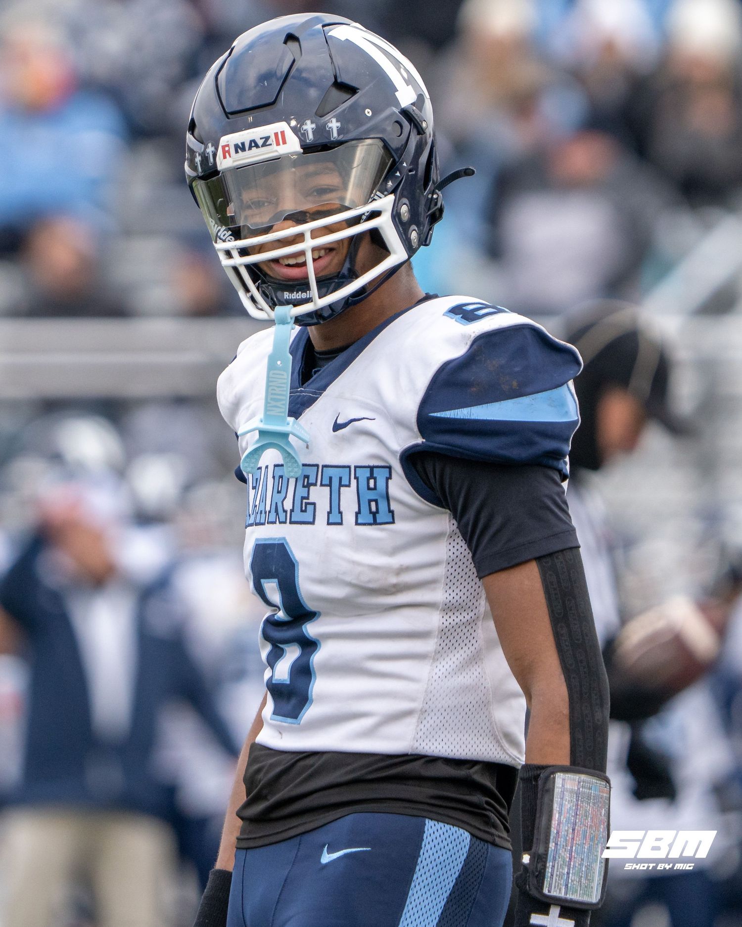 Nazareth's Trenton Walker smiles at the end of the 1st half during thier 42-8 win over Rochelle.