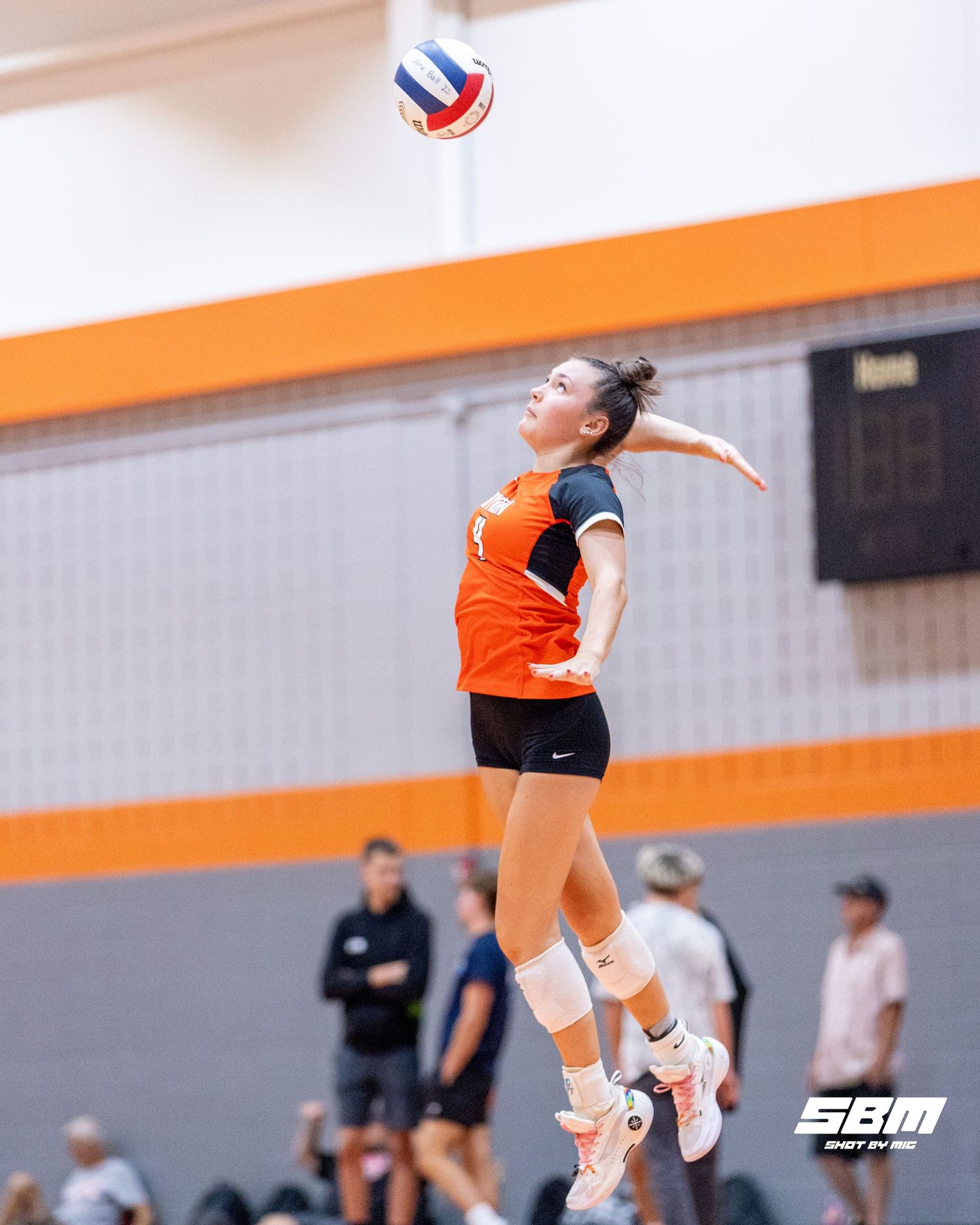 Byron's Alannah Bauer (4) leaps high to serve the ball during Byron's 2-0 win against Scales Mound on Saturday, Sep. 16, 2025