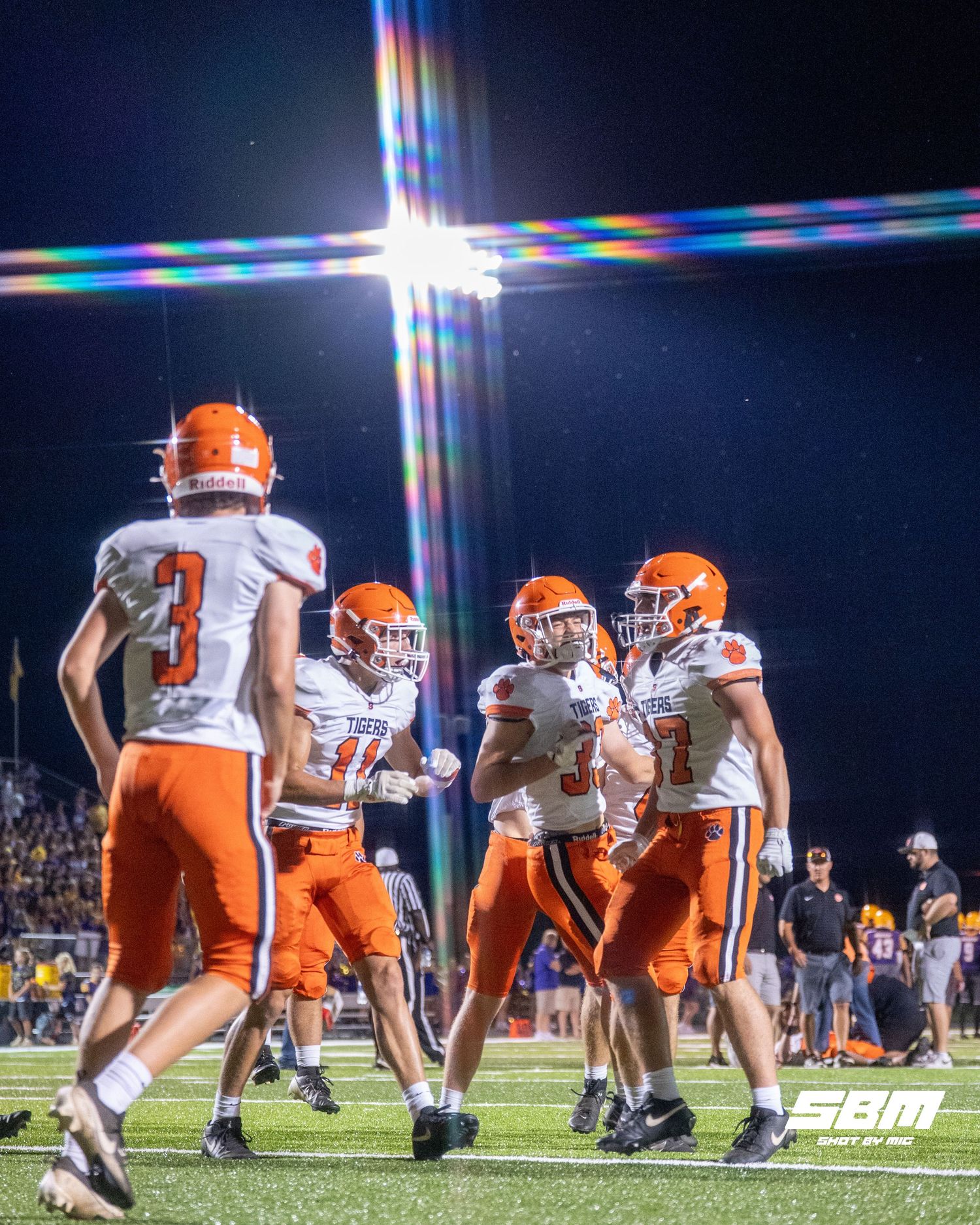 Byron's Caden Considine (37) and Weston Auker (11) begin to hype up the team during Byron's friendly scrimmage against Hononegah on Aug. 21