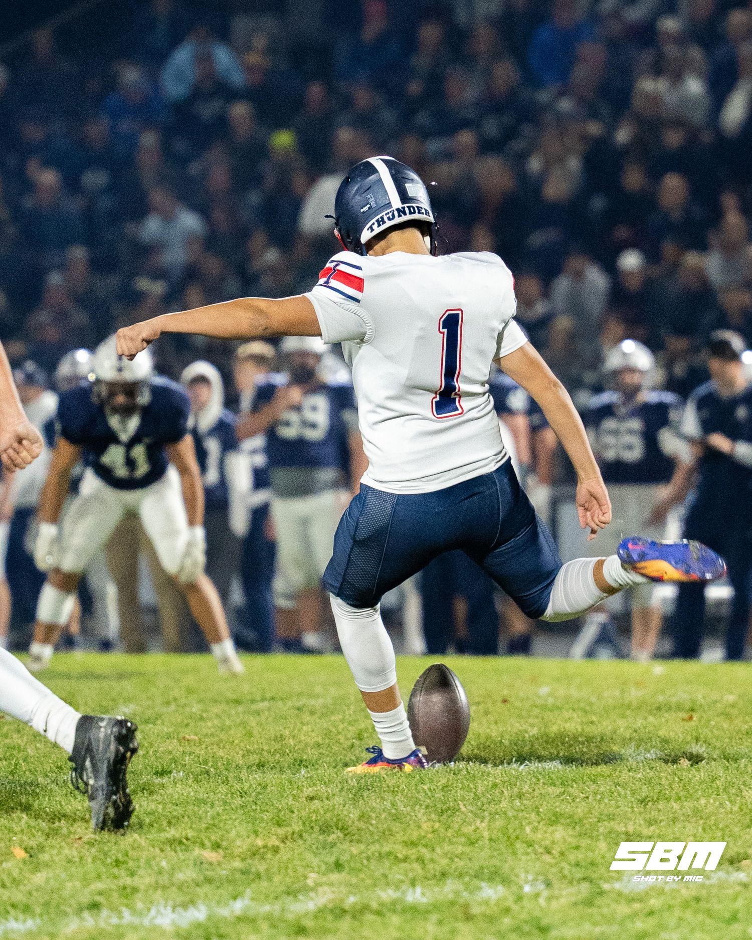 Belvidere North's JoJo Pina goes for the kickoff in their 17-13 win over Cary-Grove
