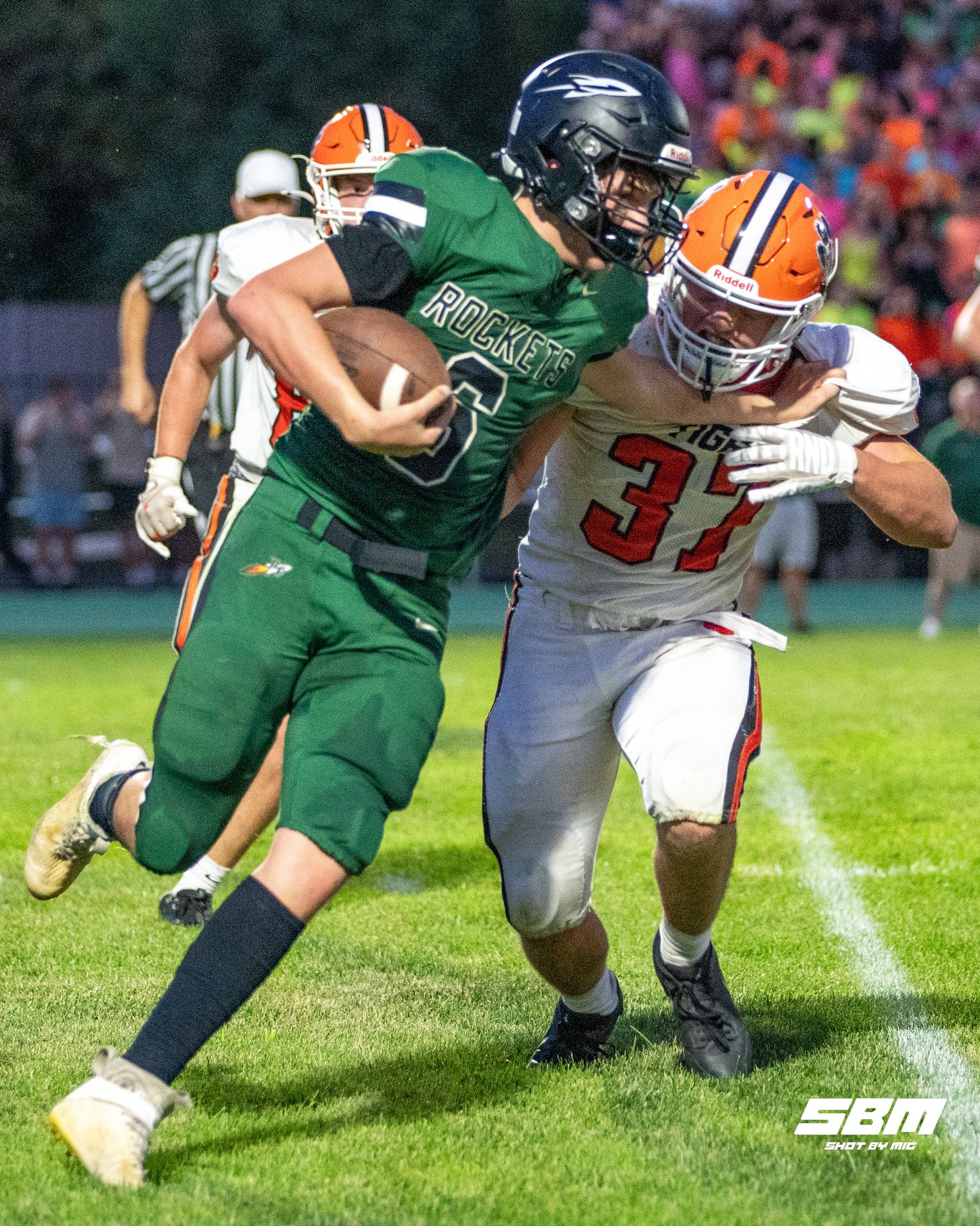 Caden Considine (37) attempts to sack the Rock Falls QB.