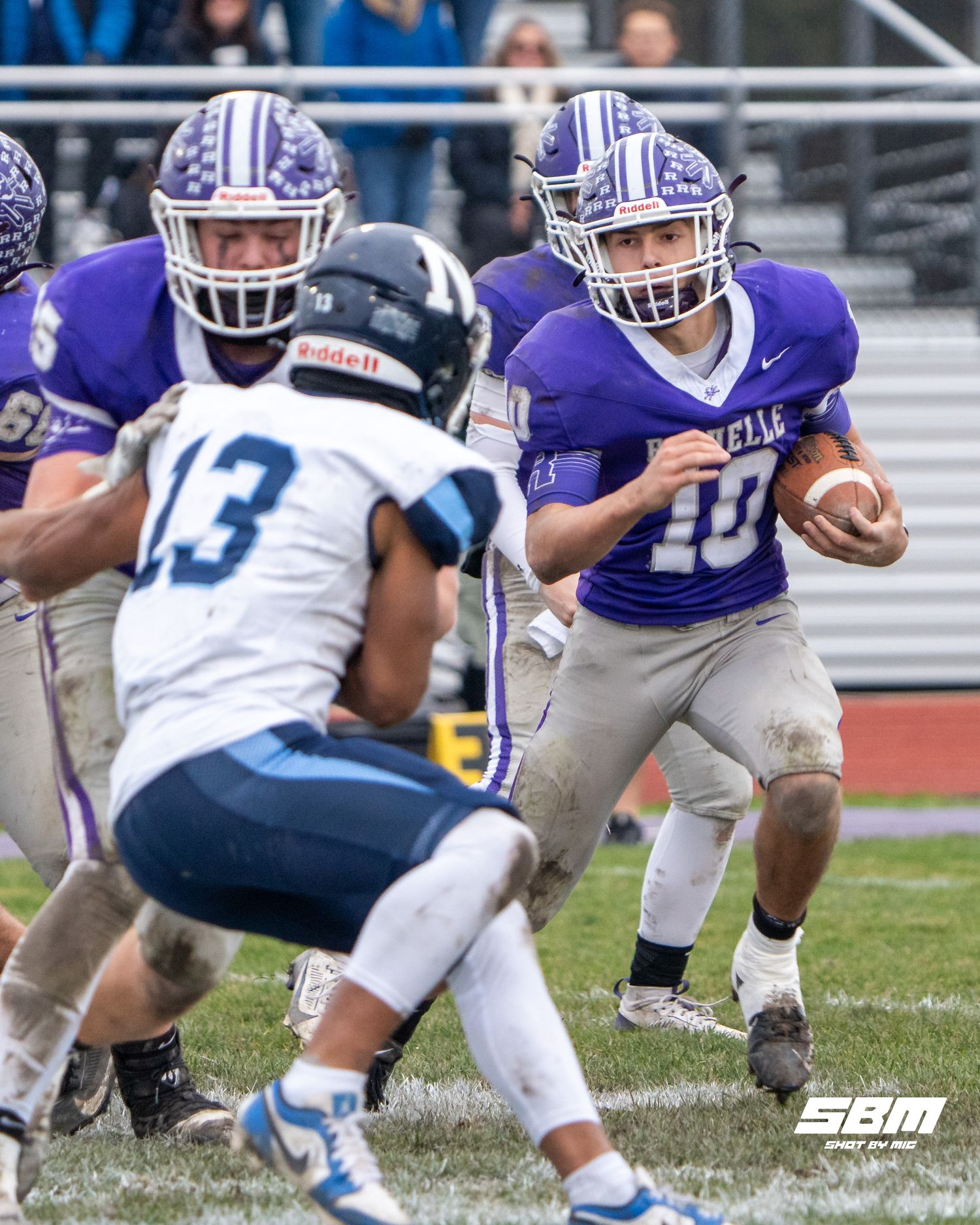 Rochelle's Dylan Manning attempts to get past the powerful Nazareth defense during their 42-8 loss against Nazareth Academy.