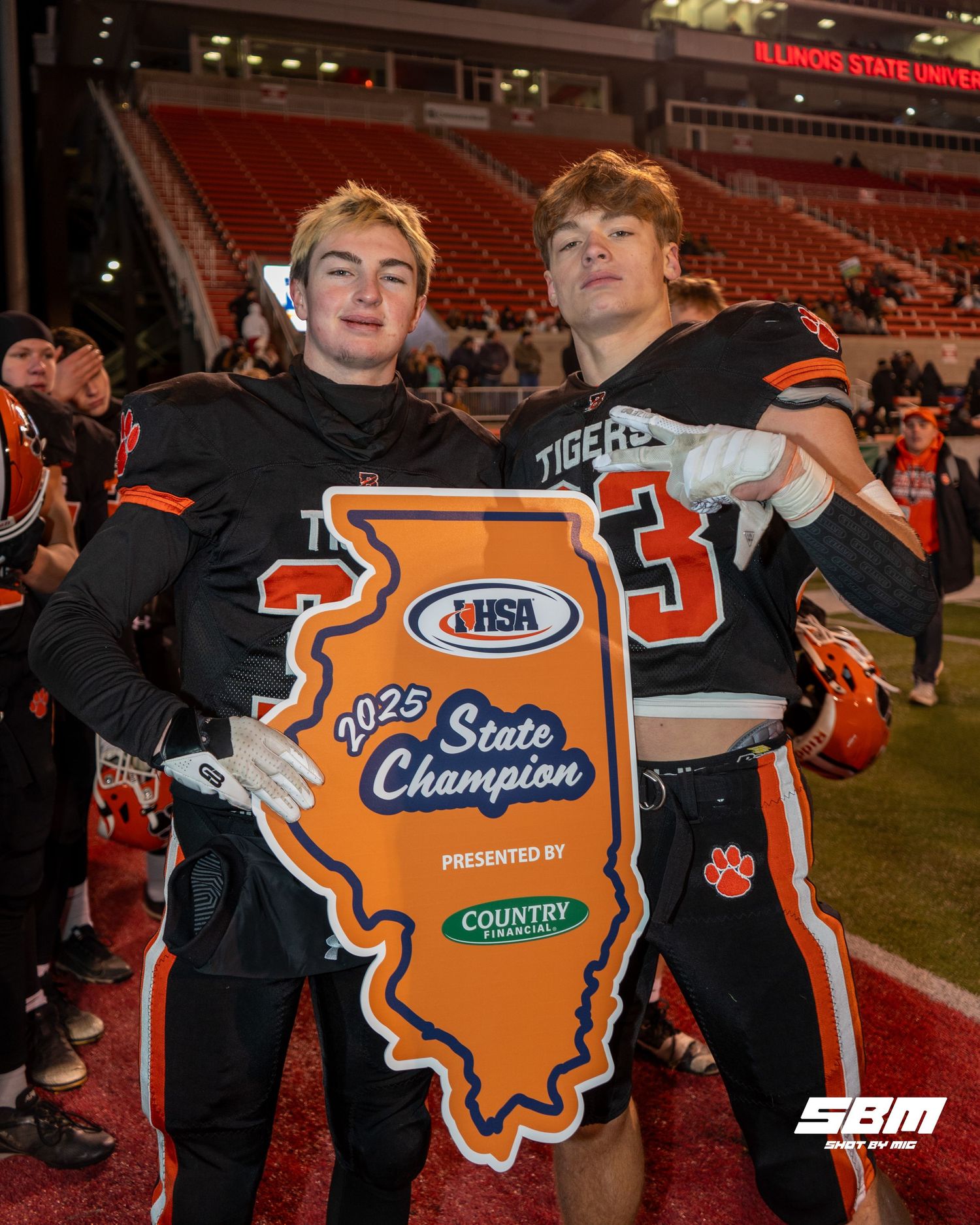 Byron's Nathan Wheeler & Ben Hiveley pose for a photo after winning the Class 3A State championship over Tolono Unity.