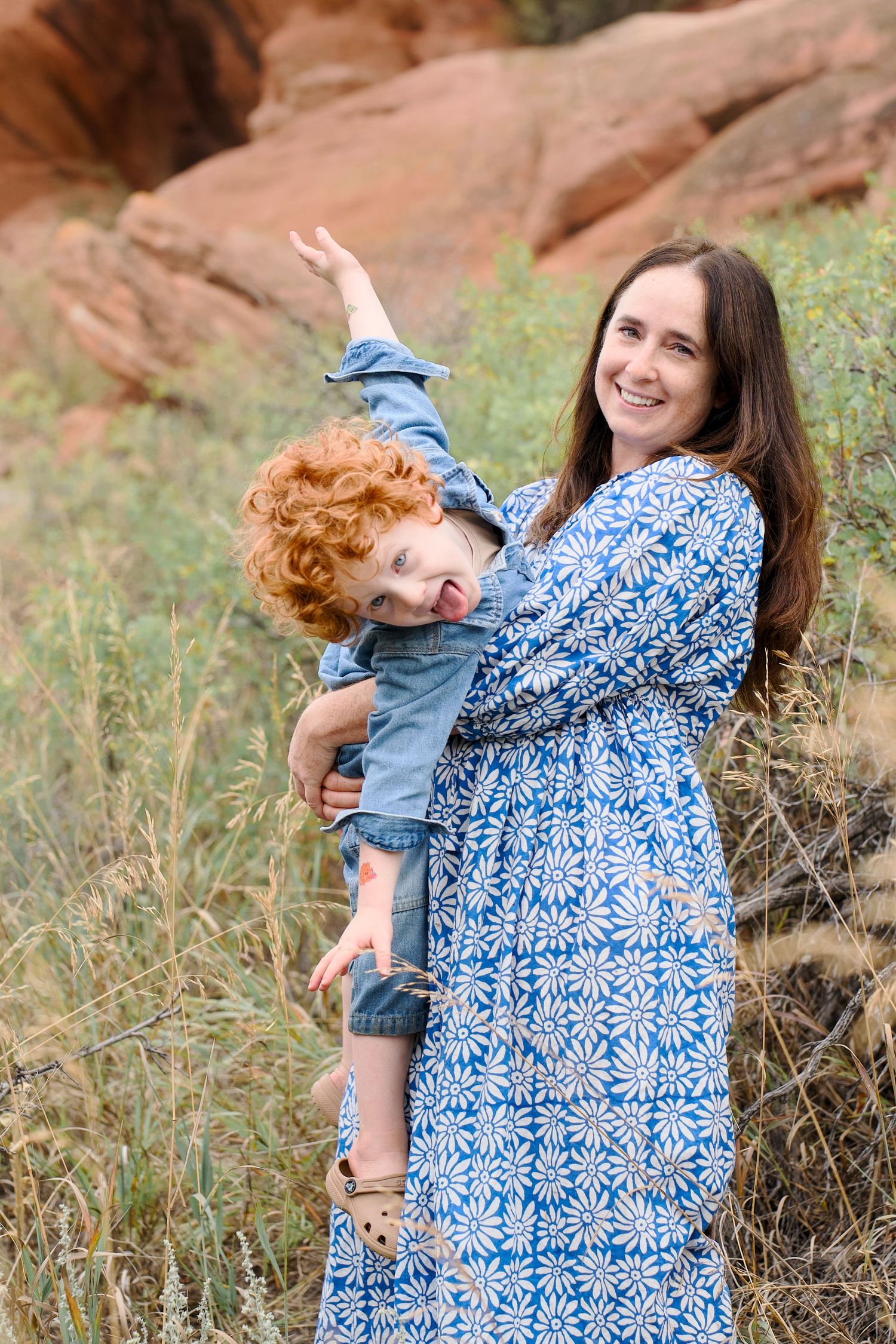 An outdoor portrait of a toddler being silly with his mother. Taken at Lory State Park near Bellevue or Fort Collins, Colorado.