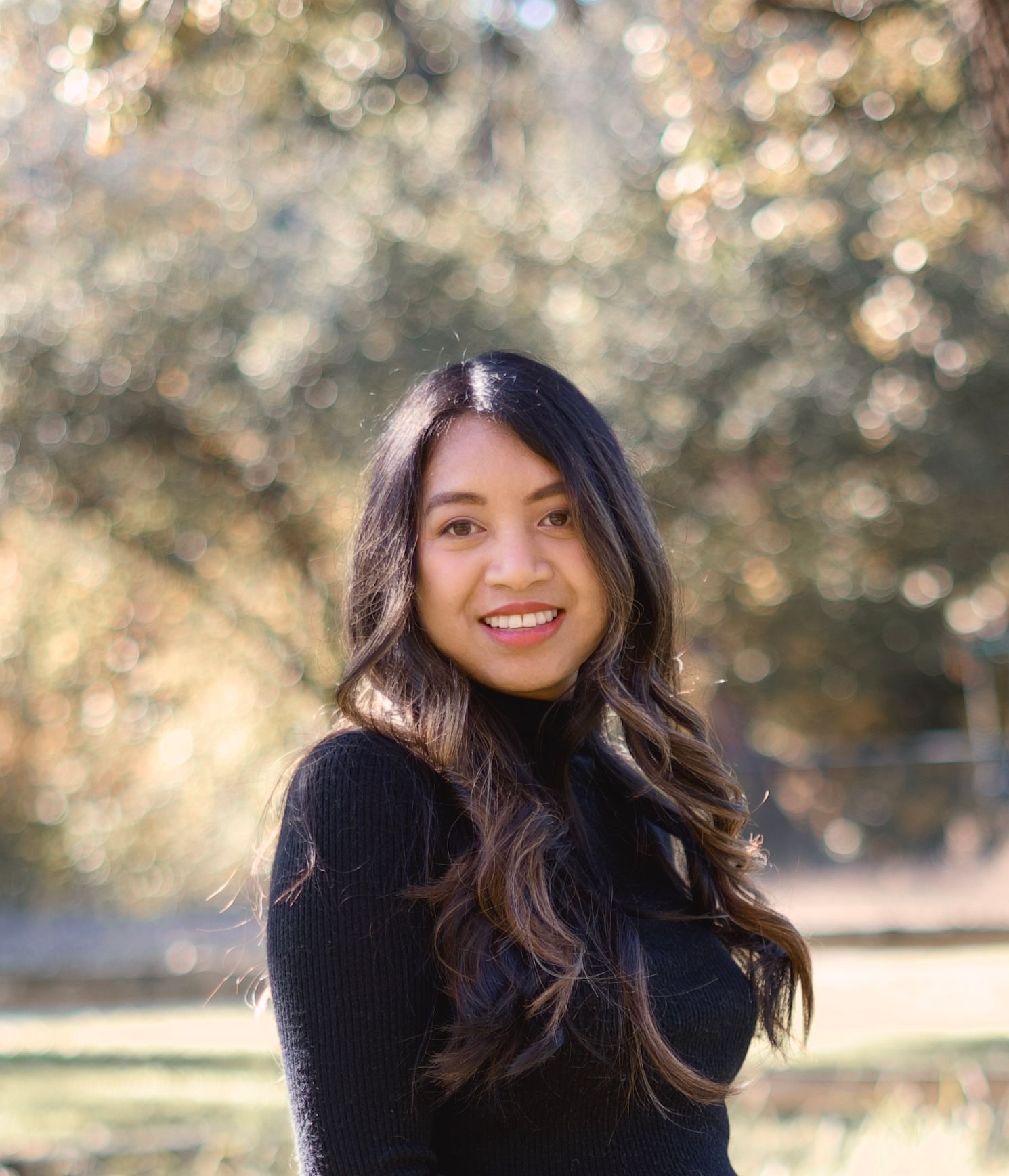 A portrait of Ida Taing, the portrait family photographer based in Fort Collins, Colorado and serving the greater Denver, & Boulder areas.