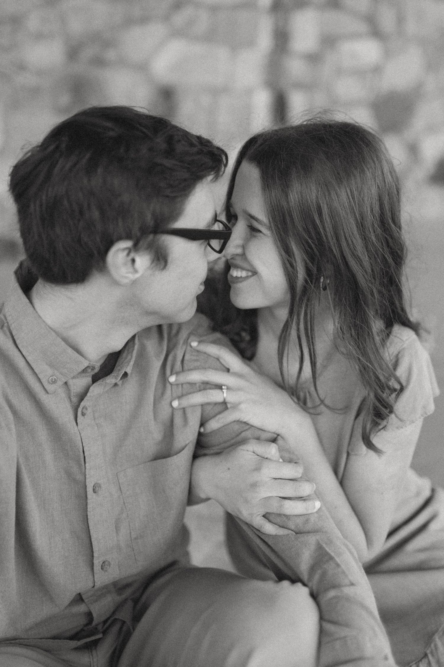 Black and white intimate portrait series of a couple sharing tender moments together.