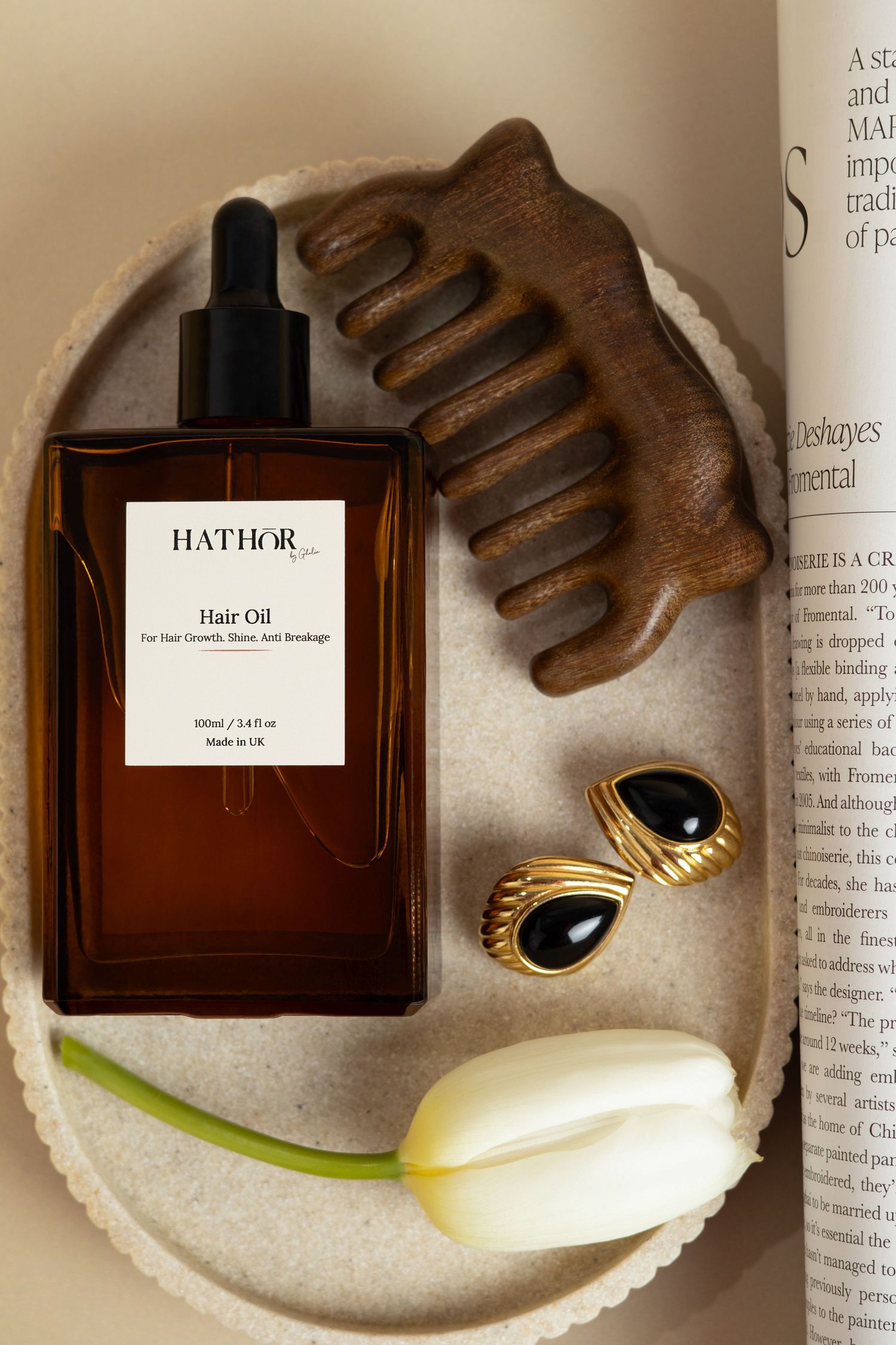 flat lay shot for high end luxury hair oil edotiral style taken by Glow Studio Yalda