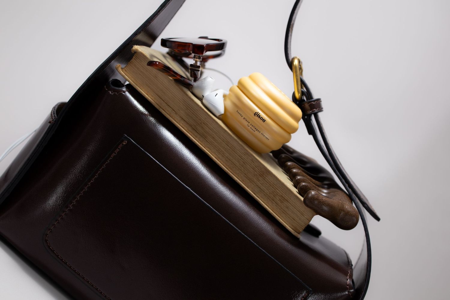 bag and lip oil product photography UK for high end luxury brand
