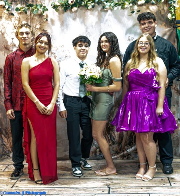 A series of playful cropped photos showing people posing casually outdoors in red and purple dresses.