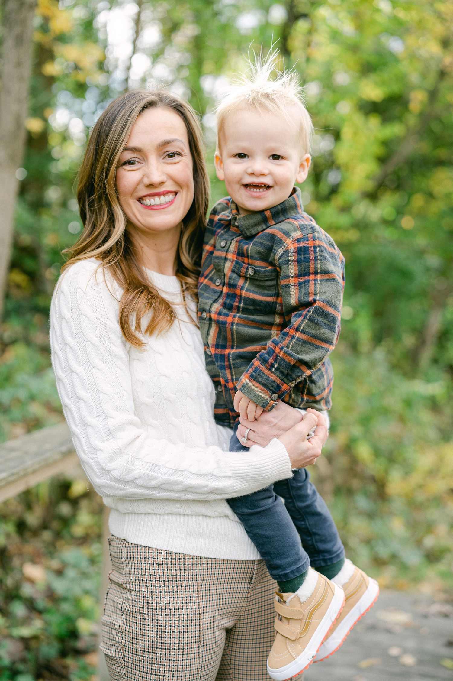 A sequence of joyful moments between parent and child wearing coordinated fall outfits against autumn foliage.