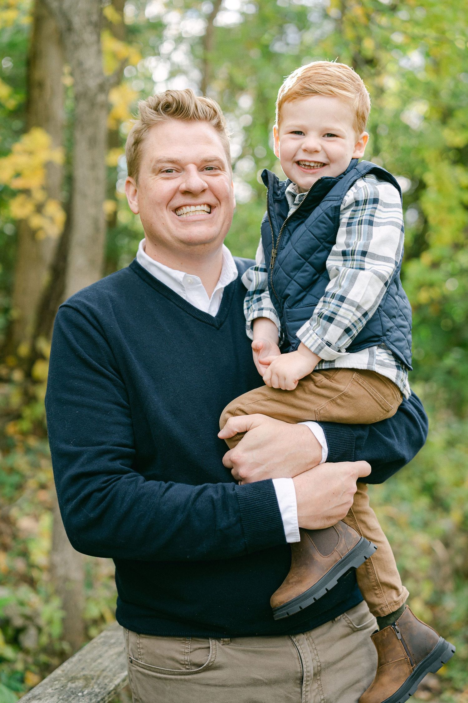 A series of heartwarming candid moments between parent and child outdoors during autumn.