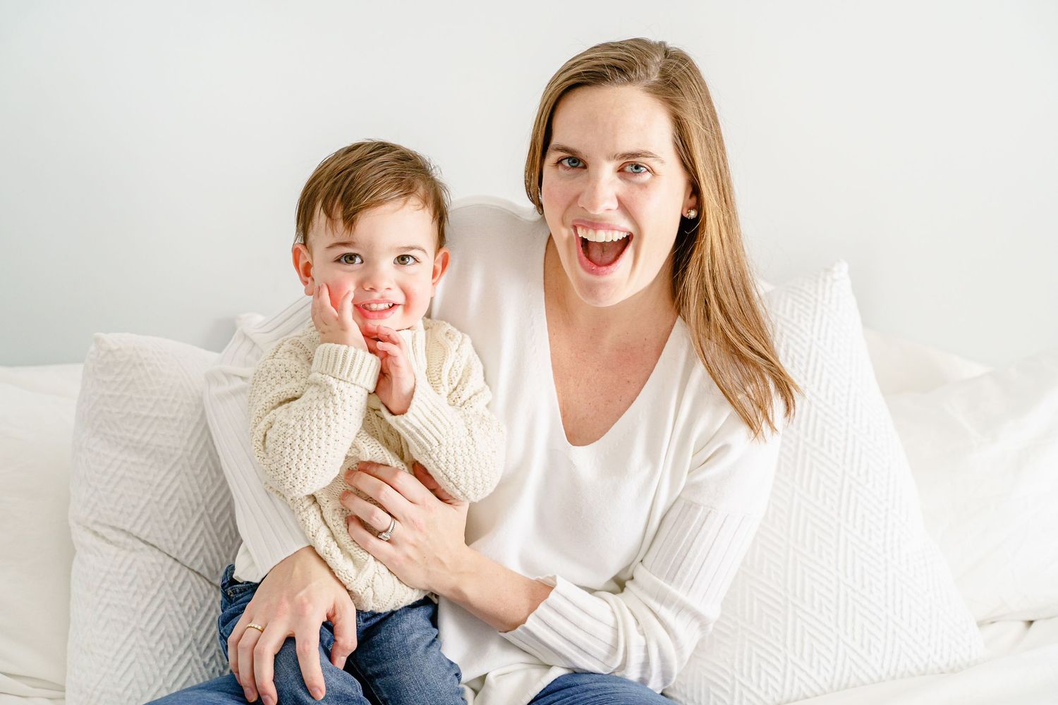 Joyful lifestyle portraits of family members interacting on white background.