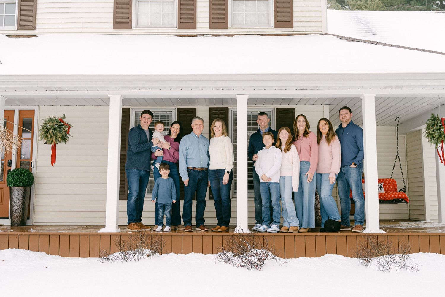 A collage of people standing together on a porch in formal attire for a special occasion.