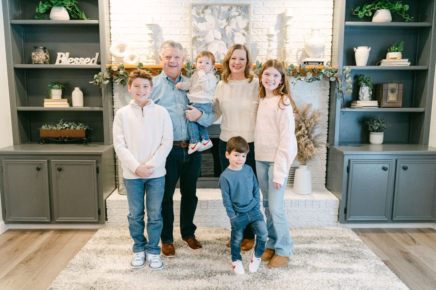 A collage of family photos showing matching denim outfits and casual poses in a cozy home setting.
