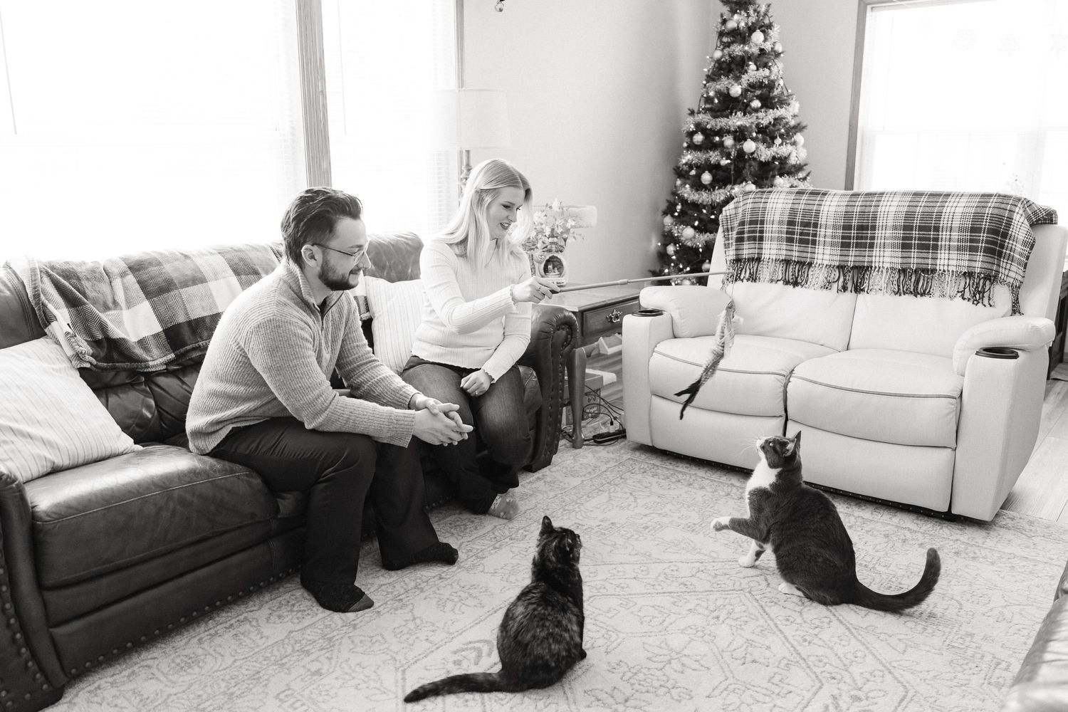 A series of black and white photos showing people relaxing and lounging in various casual indoor settings.