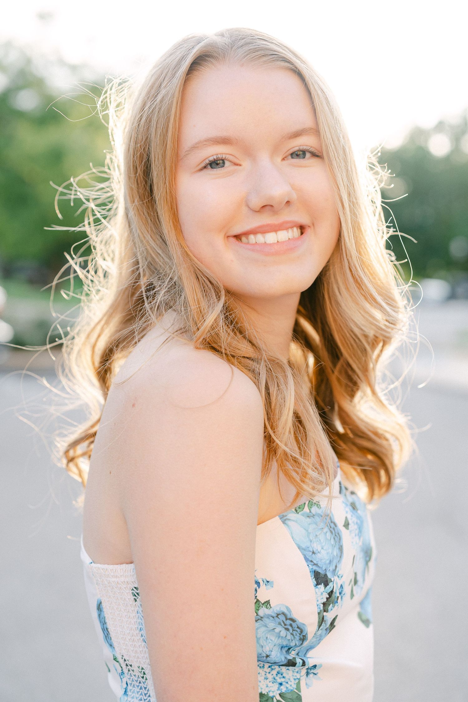 A series of outdoor portrait shots showing someone in a light blue dress with sunlit hair and a bright smile.