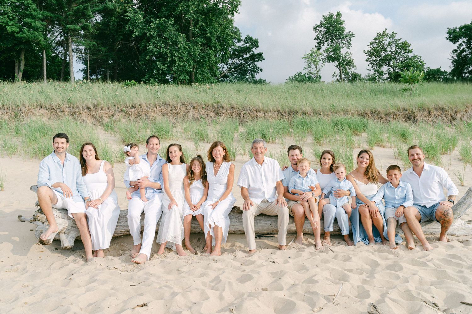 A collection of relaxed outdoor family photo sessions with coordinated white and neutral outfits in natural settings.