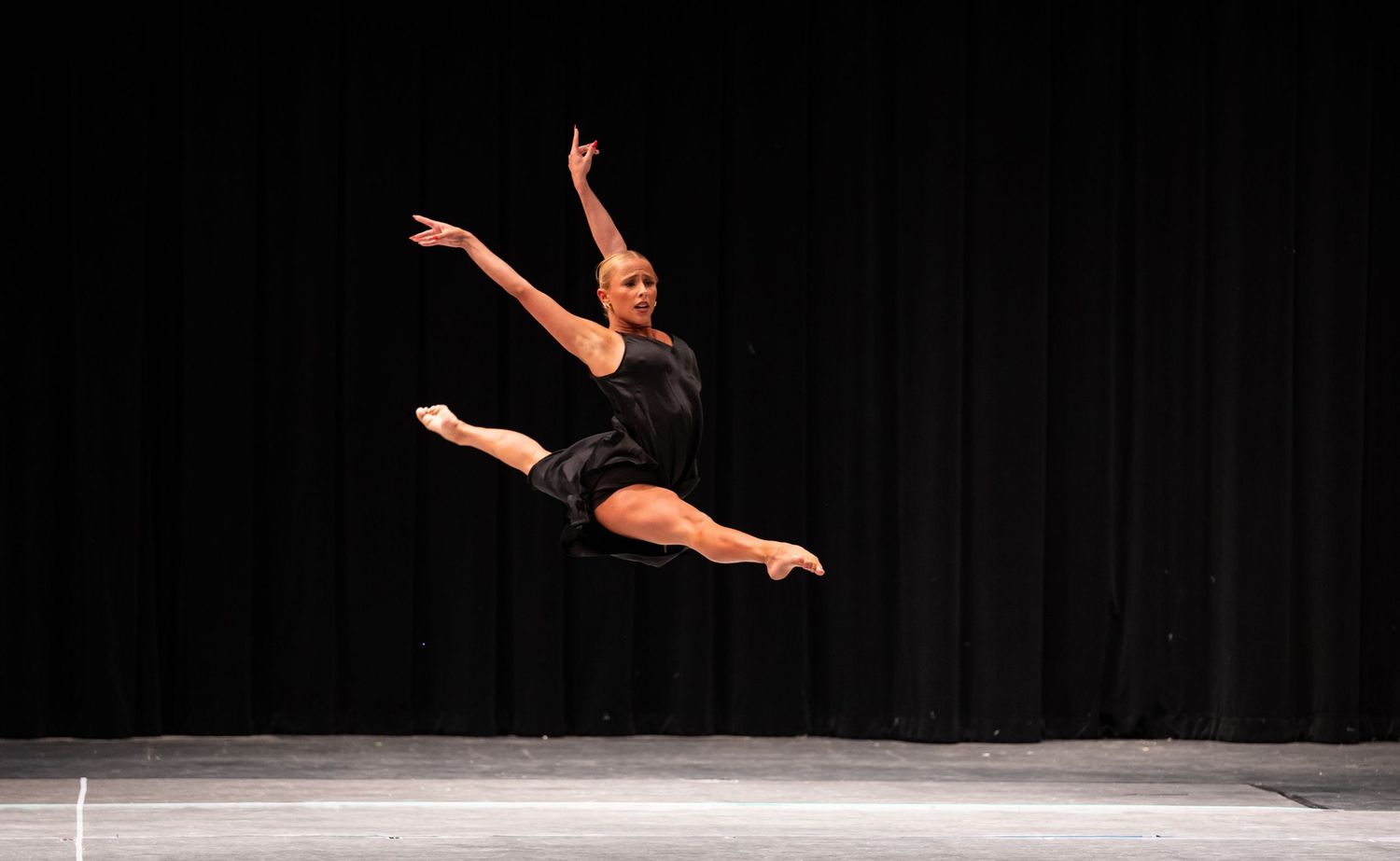 Dancer preforming a dramatic leap