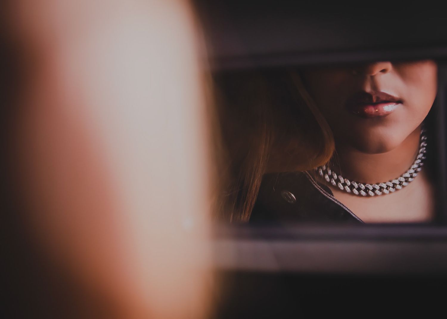 a girls lips in the mirror