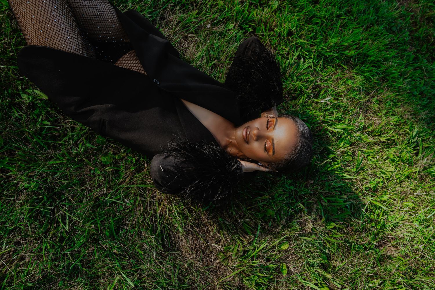 Girl in tall grass posing-editorial
