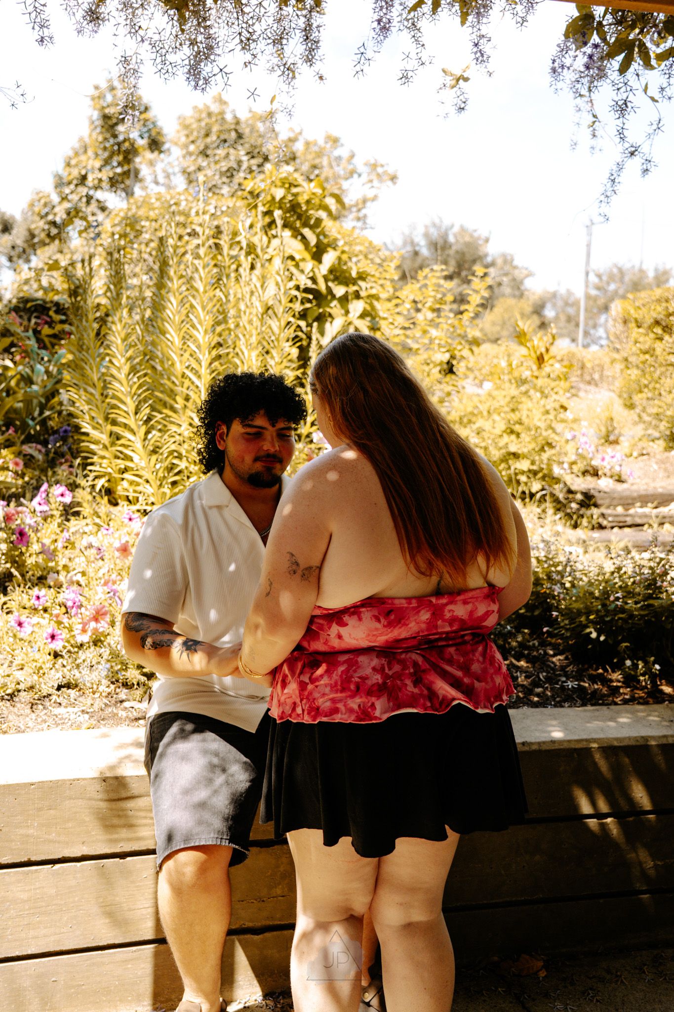 A sequence of vintage-style photos showing a couple dancing together in a sunlit outdoor setting.