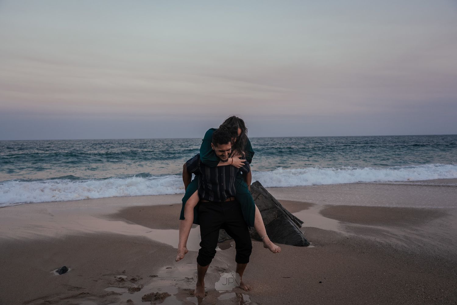 A series of romantic beach scenes at sunset showing silhouettes walking along the sandy shore near the ocean waves.