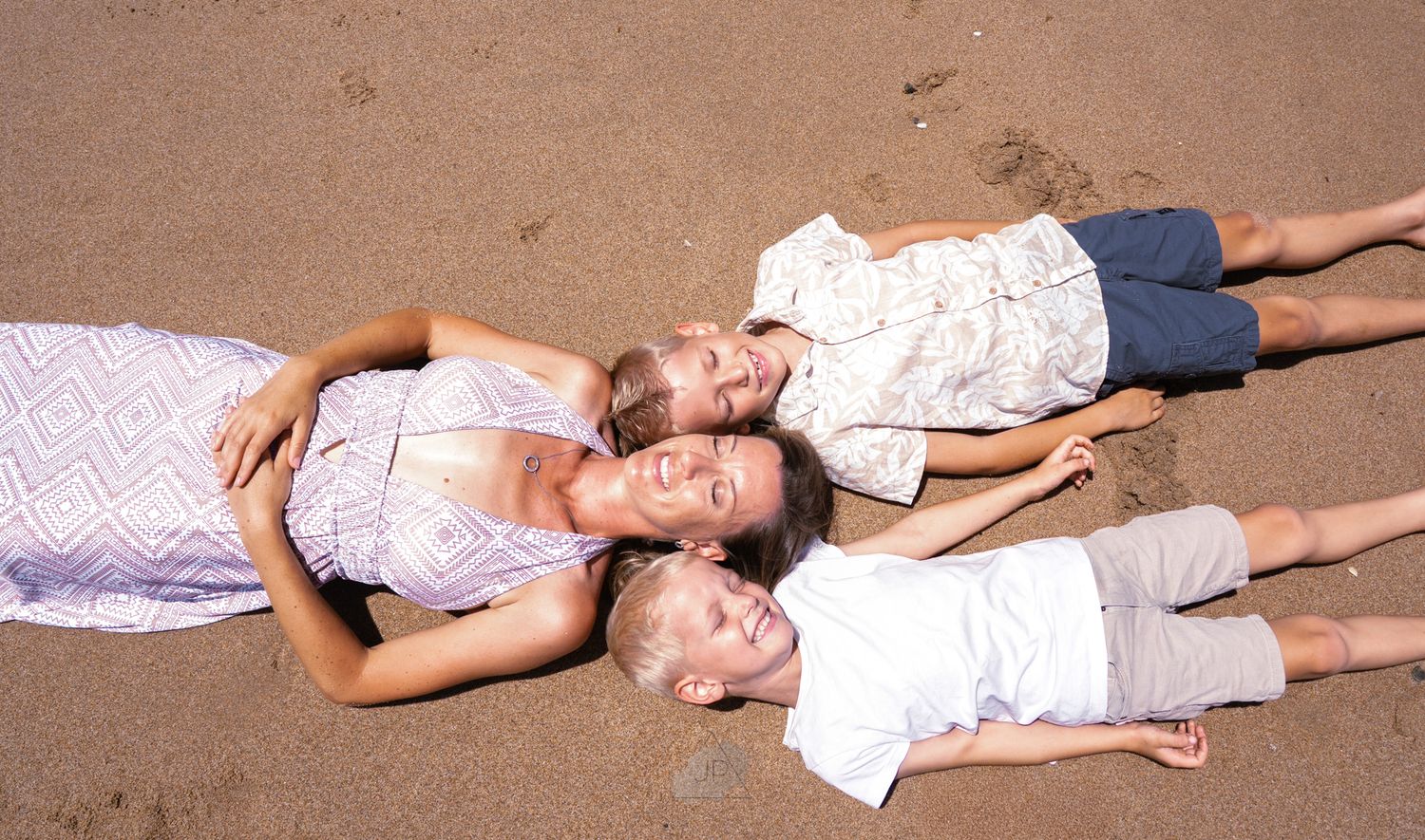A sequence of photos showing a person lying down in different poses on a brown surface.