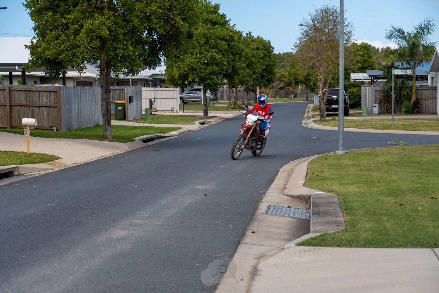 A sequence of visuals showing a person riding a scooter along various paved paths in a residential neighborhood.