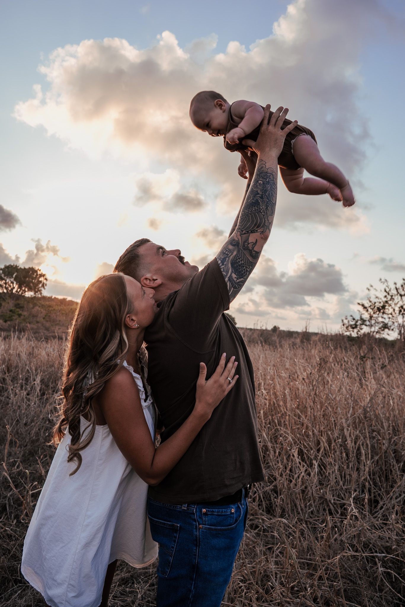 Sweet family interactions captured in a series of candid moments at dusk.