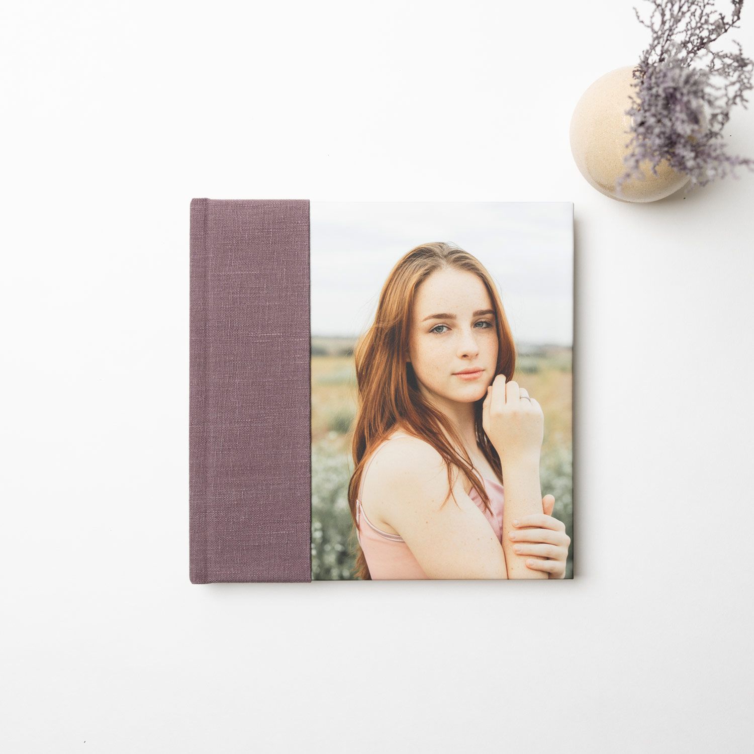Series of photo album covers showing artistic portrait layouts.