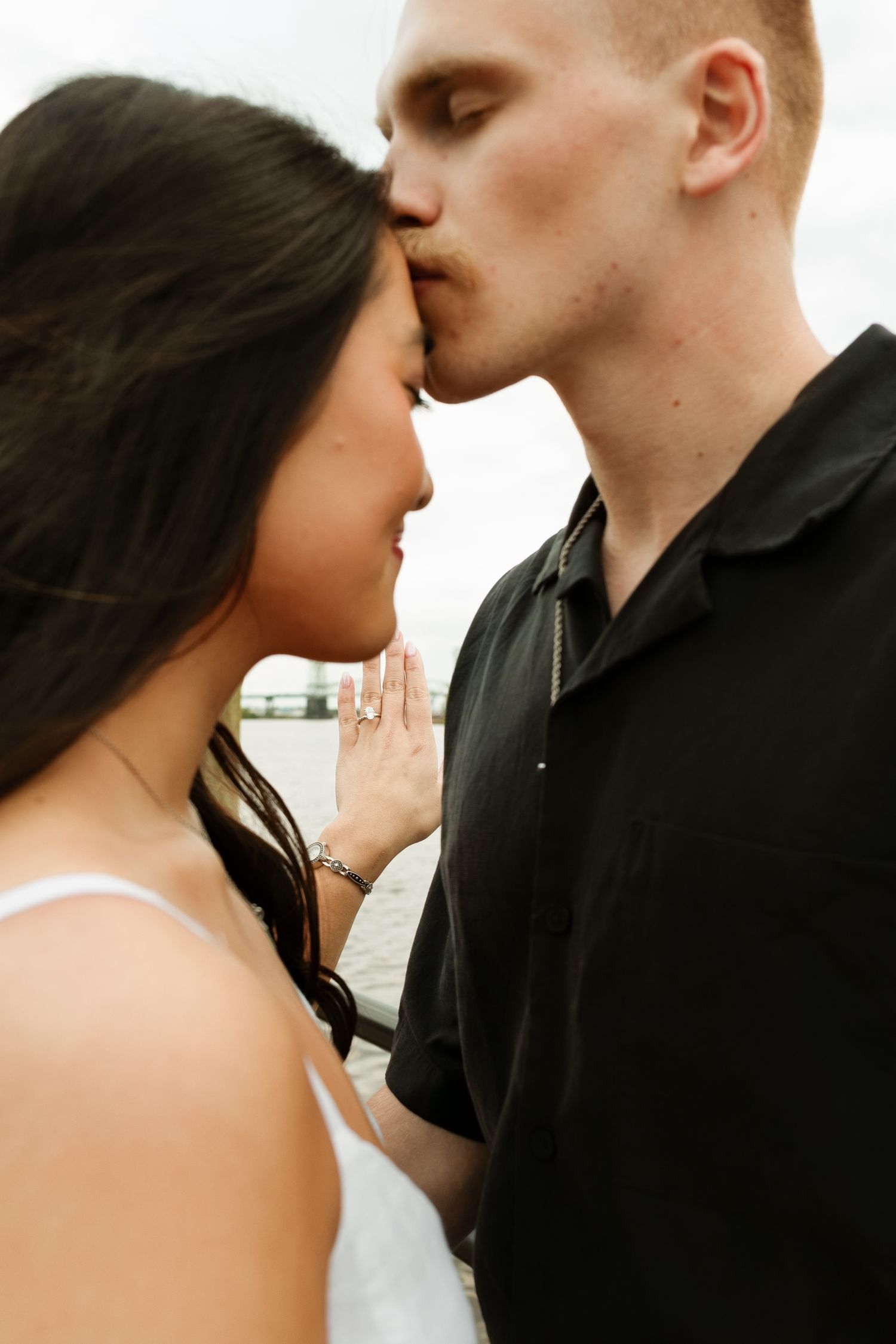 Romantic black and white close-up sequence of a couple sharing an intimate kiss. Alex Faye Photography Alex Faye Media Wedding Raleigh