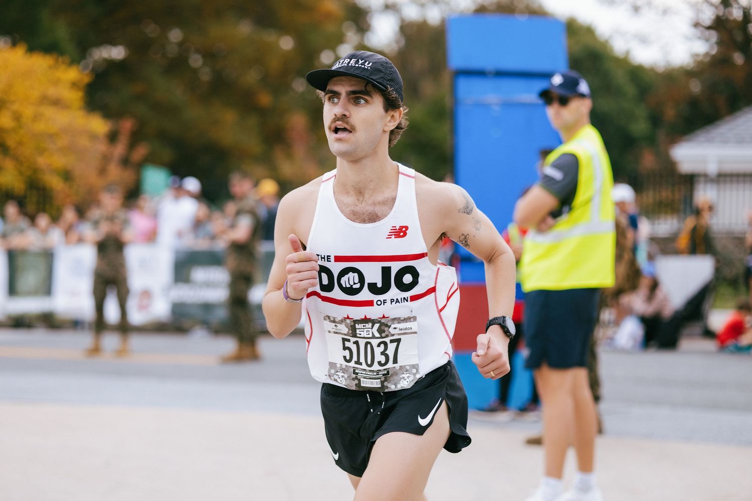 Runner competing in the Marine Corps Marathon in Arlington, Virginia, during a long-distance race and athletic event