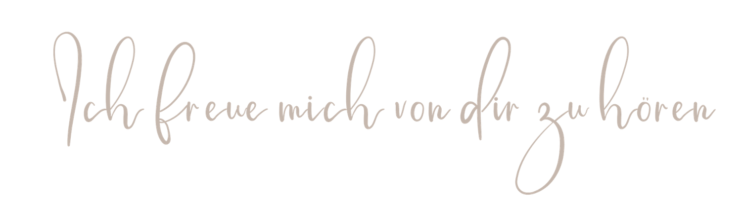 Handwritten text in German cursive script appears on white paper with faint pencil lines.