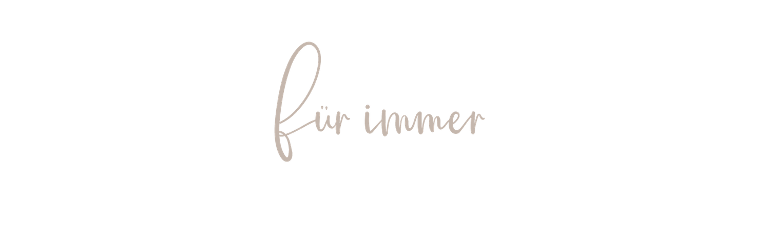 A handwritten text in black ink on white paper reads 'Für immer' in cursive lettering.