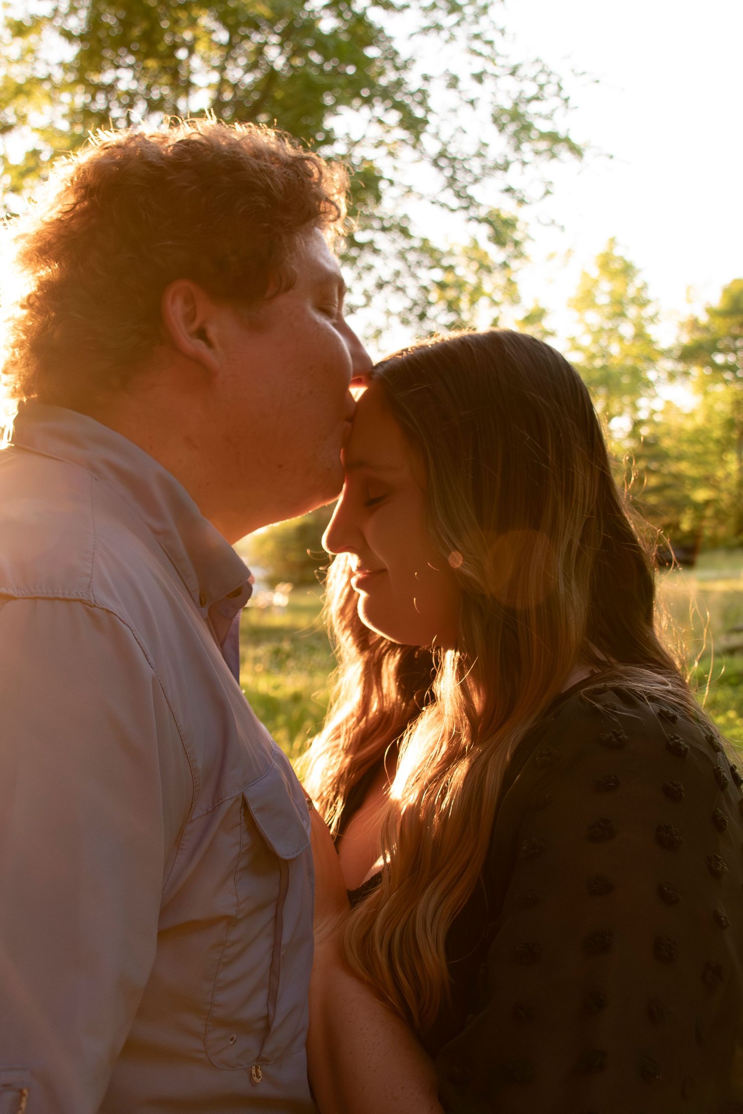 Romantic couple sharing a quiet moment at golden hour