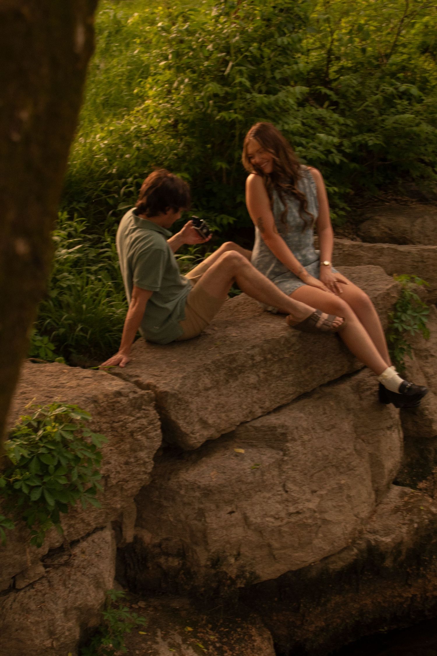 Joyful couple embracing in a scenic Tennessee field