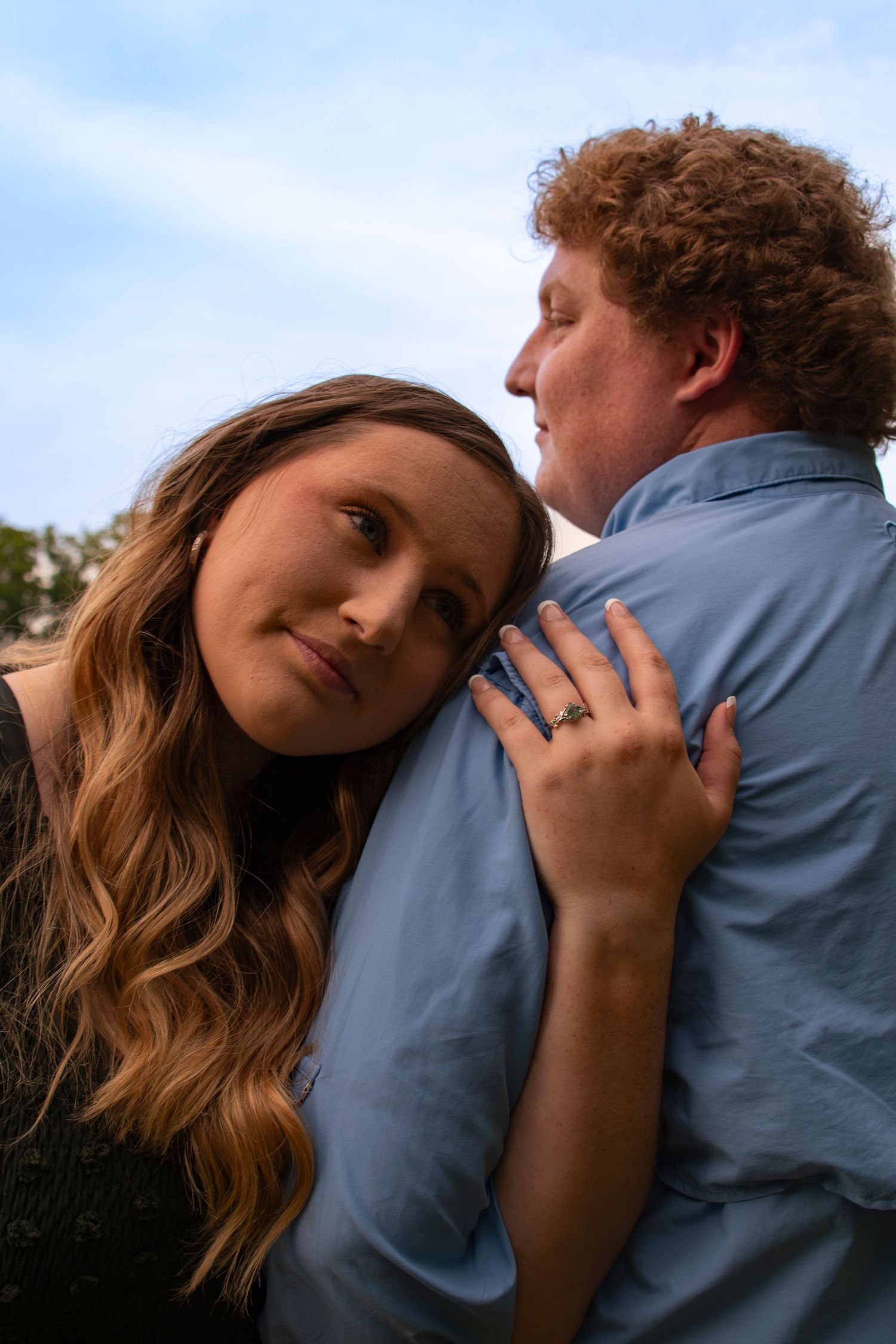 Romantic engagement session filled with genuine laughter