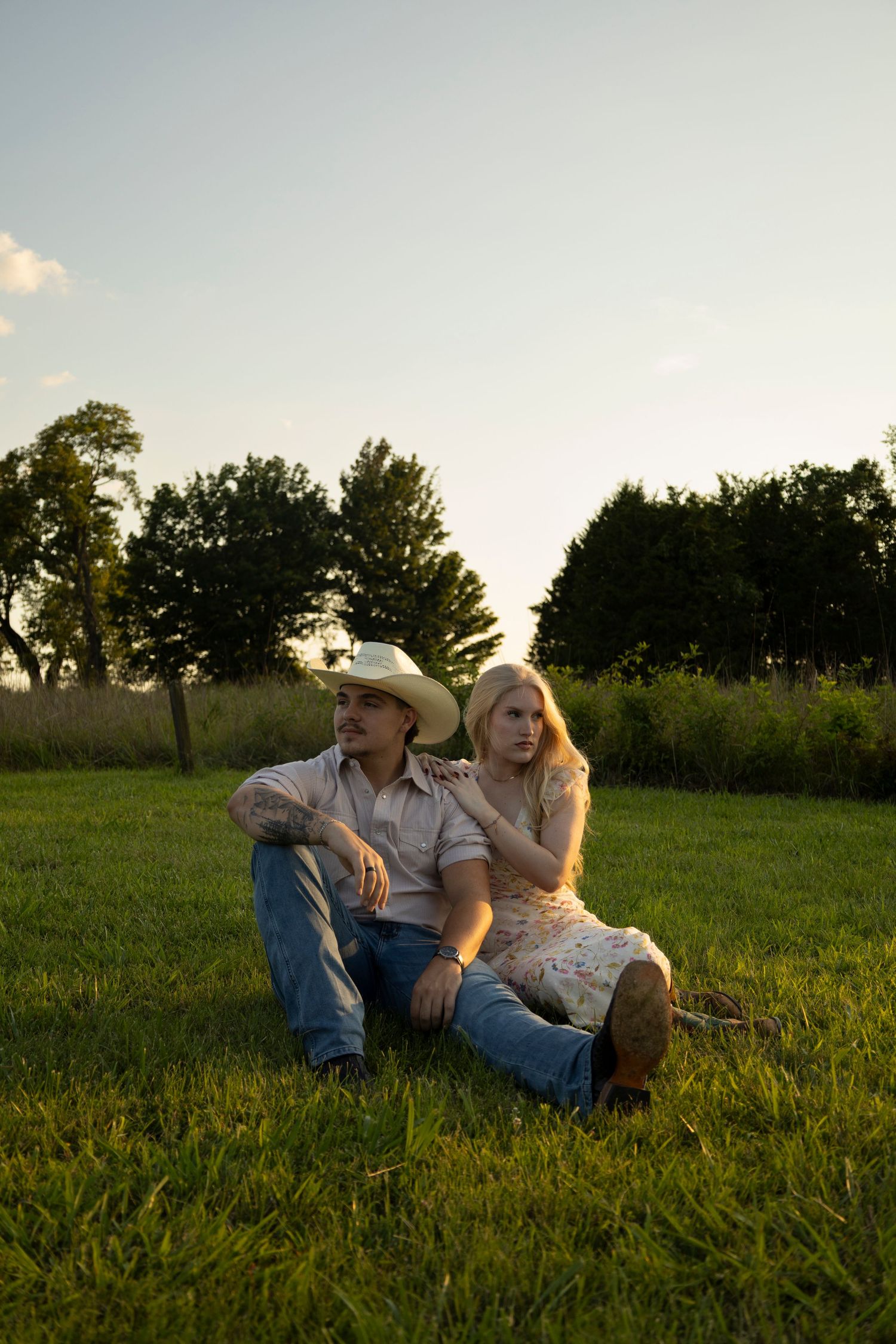 Joyful couple embracing in a scenic Tennessee field