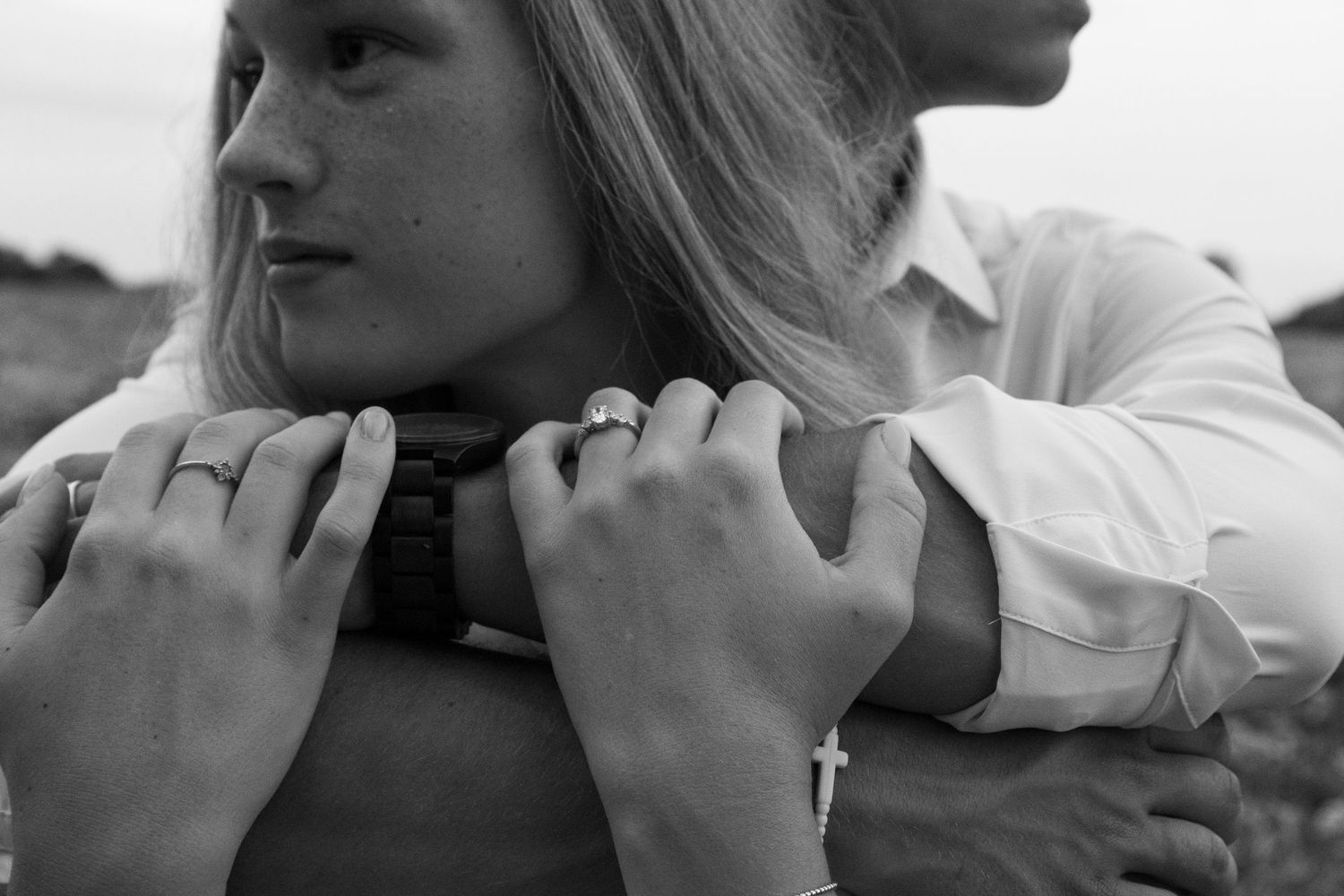 Joyful couple embracing in a scenic Tennessee field