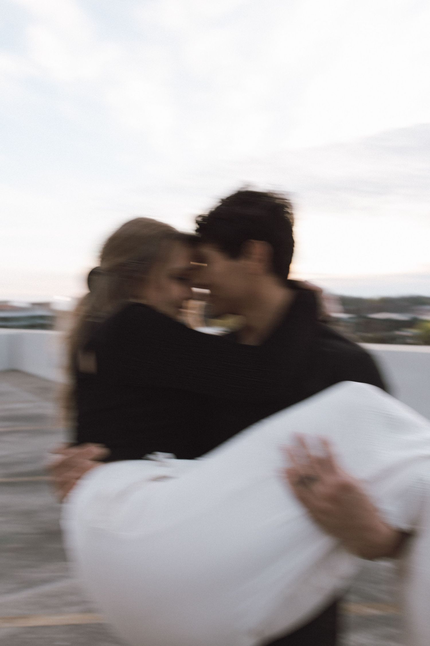 Romantic engagement session golden hour couple laughing