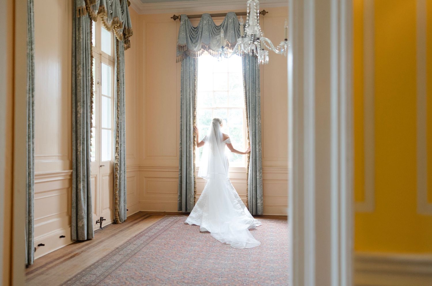 Bride taking bridal portraits at Lowndes Grove