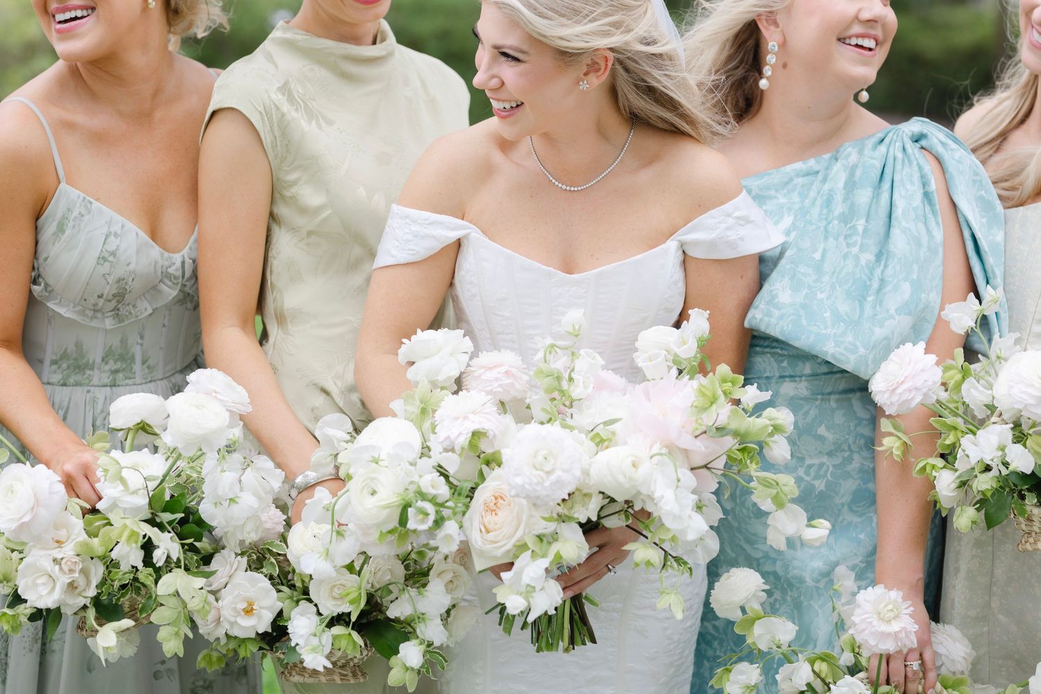 Bride and bridesmaids at Lowndes Grove in Charleston, SC. Stunning florals and bouquets