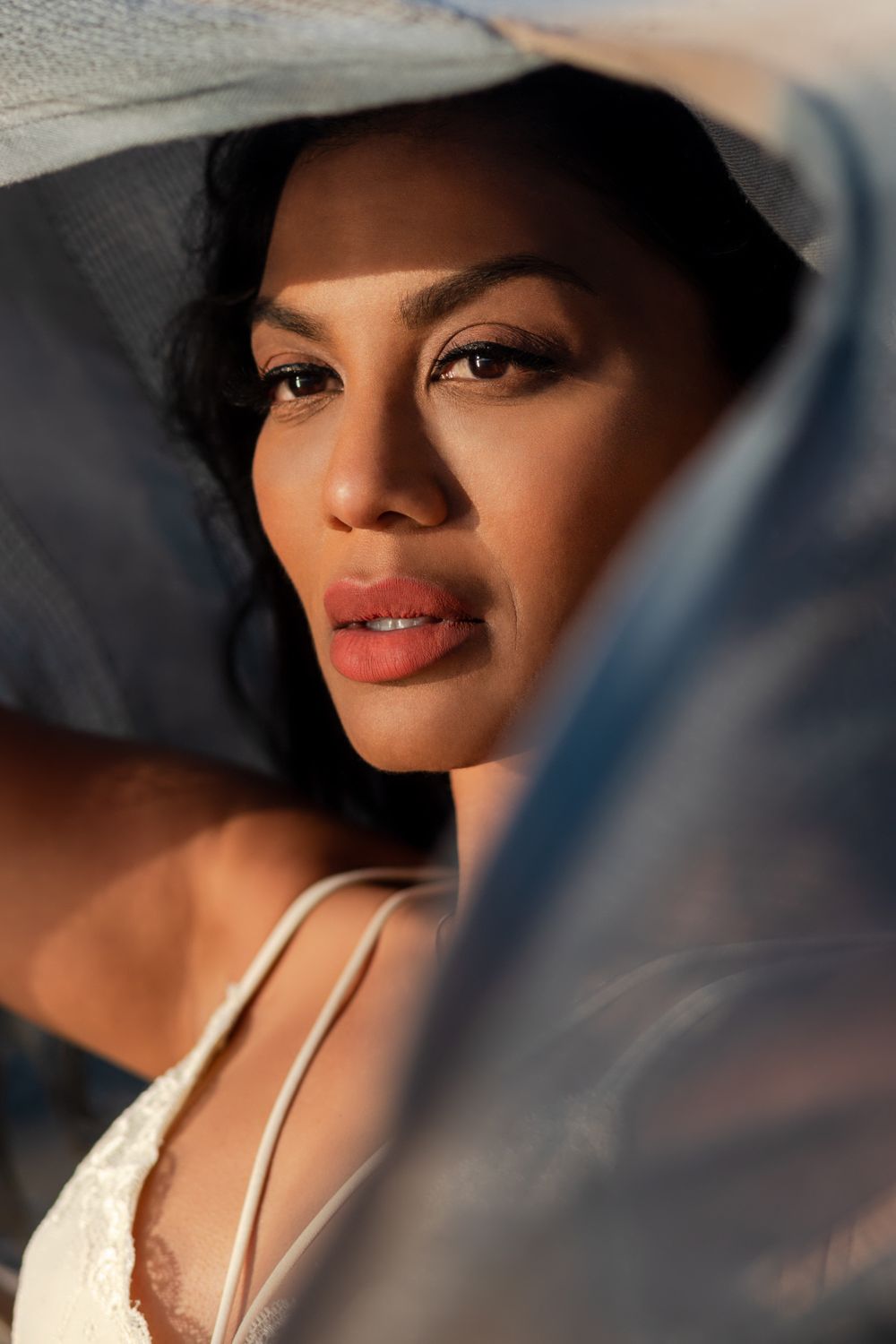Close-up portrait series showing glamorous makeup and elegant styling.